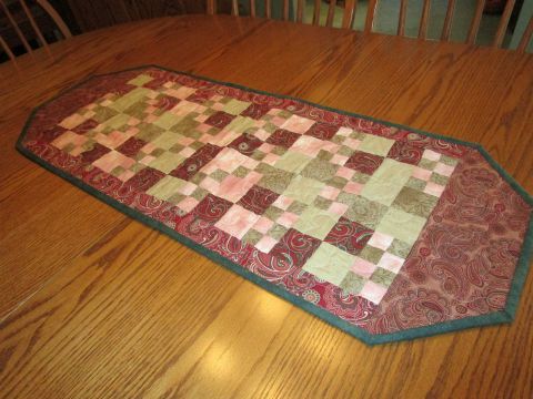 Table Runner 15” x 30” Brown, pink, tan patchwork.  Placemats to match